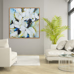 Abstract botanical artwork on a wall framed in oak in the living room. The artwork is done by the Canadian artist Mona Atelier