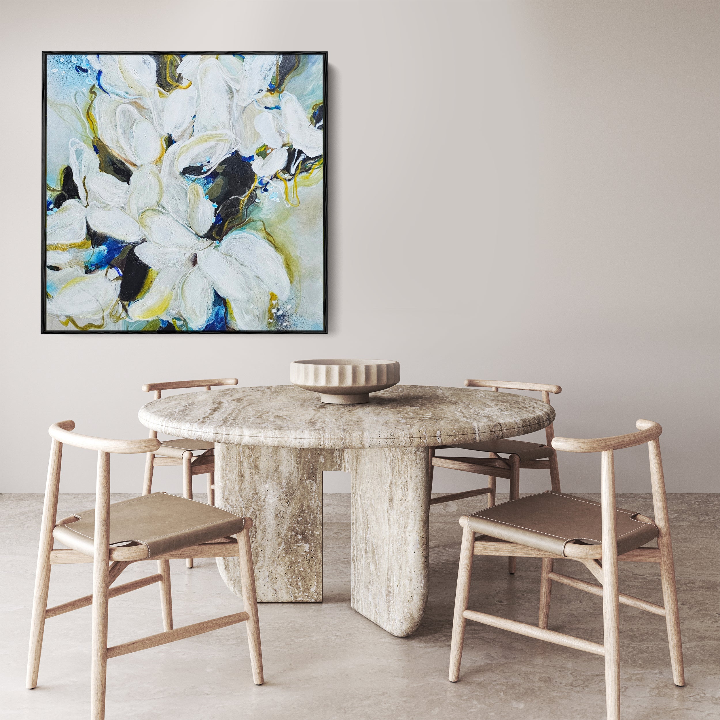 A large square 48 x 48” abstract, botanical original artwork done by the Canadian artist Mona in the colours of blues, beige, dark greens and white framed in a black frame on the wall in a kitchen