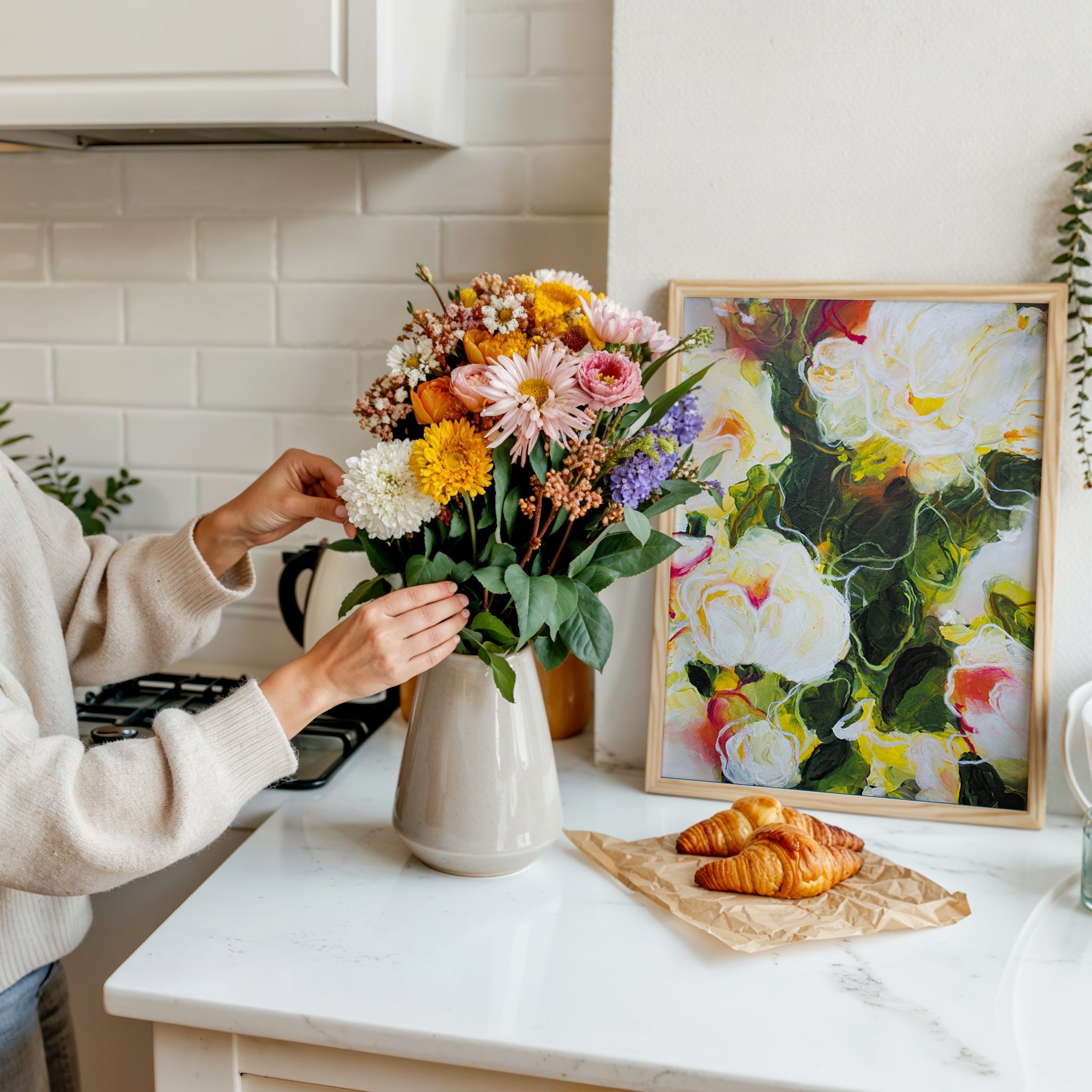 Printed and framed high-quality reproduction of Mona‘s original artwork on a countertop in a kitchen