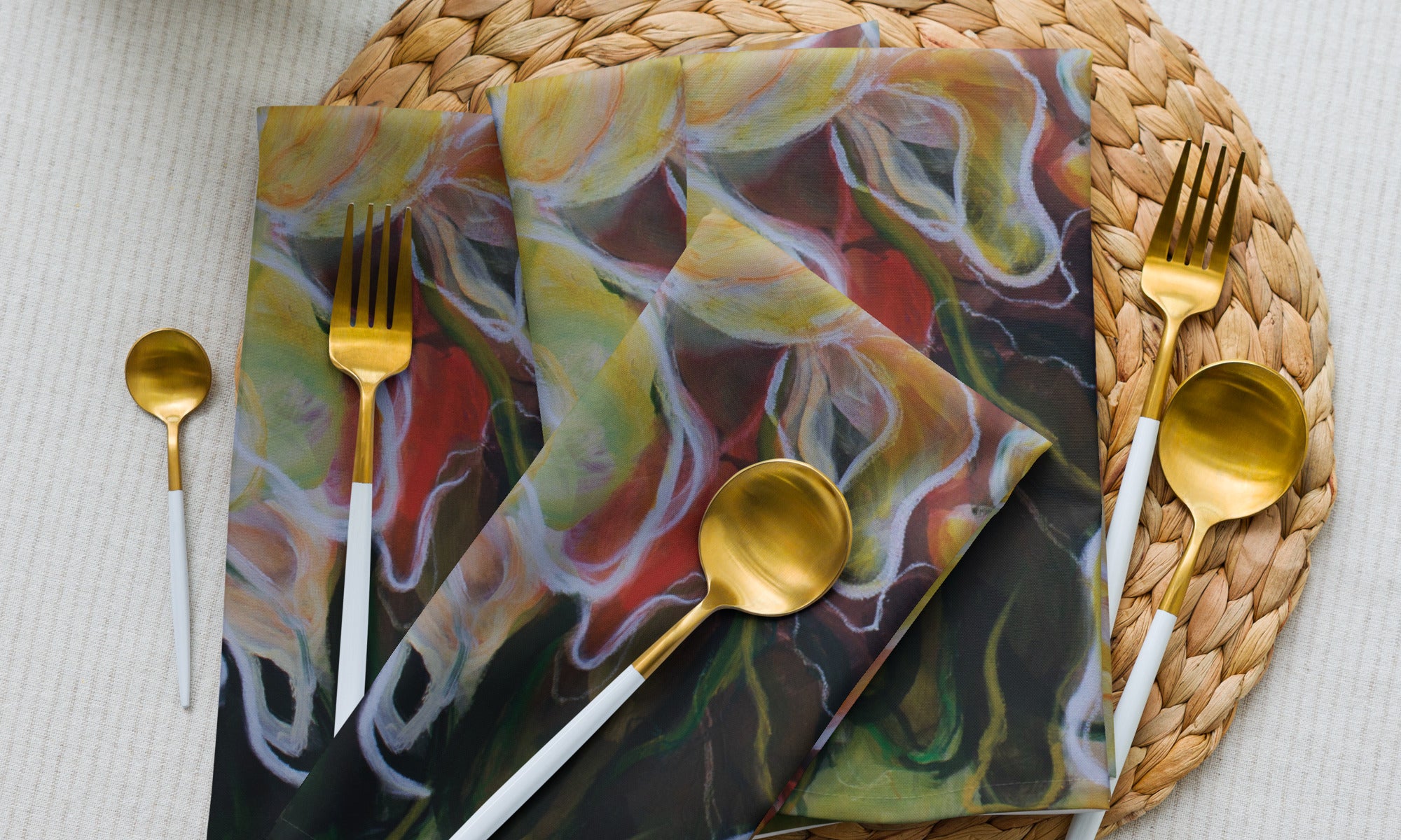 Product mockup. set of four napkins 20“ x 20“ printed with Mona’s original artwork in greens oranges yellows and white